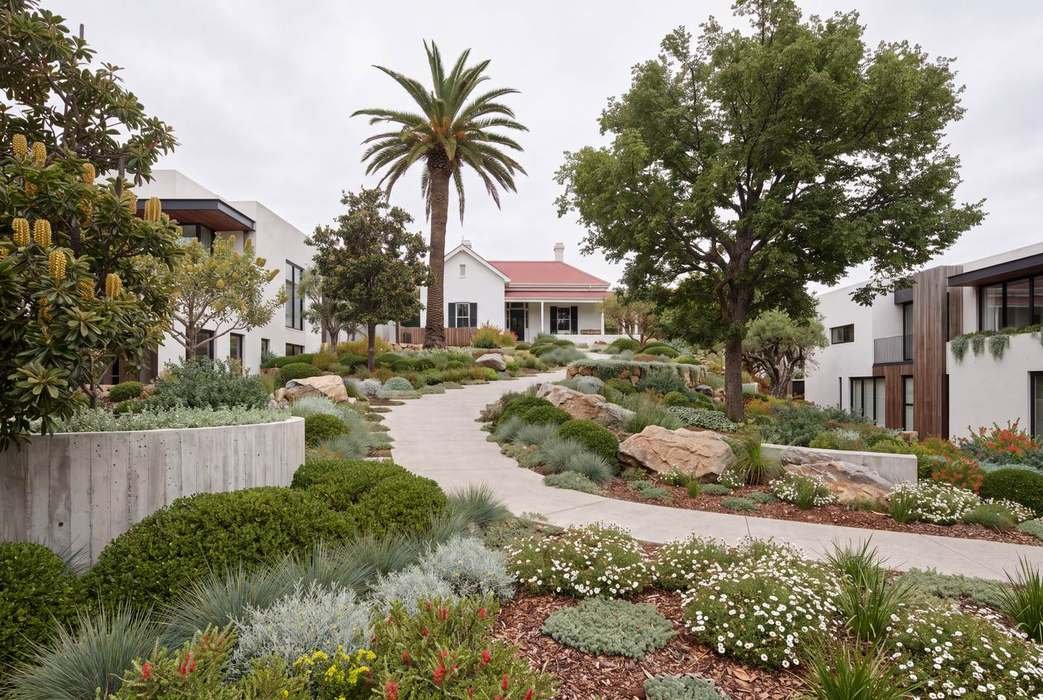 Garden path leading to heritage house